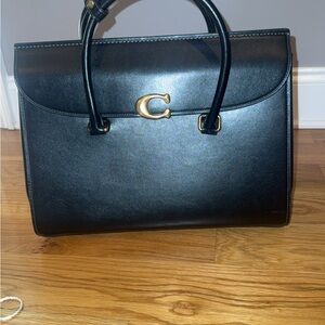 Black Leather Coach Broome Carryall 36 comes with dust bag